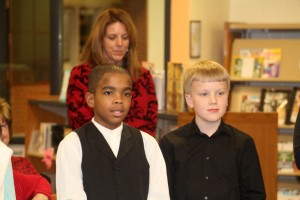 Benjamin Harrison Elementary students, from left, Jeffery Jones and Paul Smith talk to the Marion City Schools Board of Education at its Jan. 4 meeting about becoming a Leader in Me Lighthouse School.