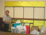 Dan DeVille, First Energy Representative, dropping off items collected by the employees at FirstEnergy.